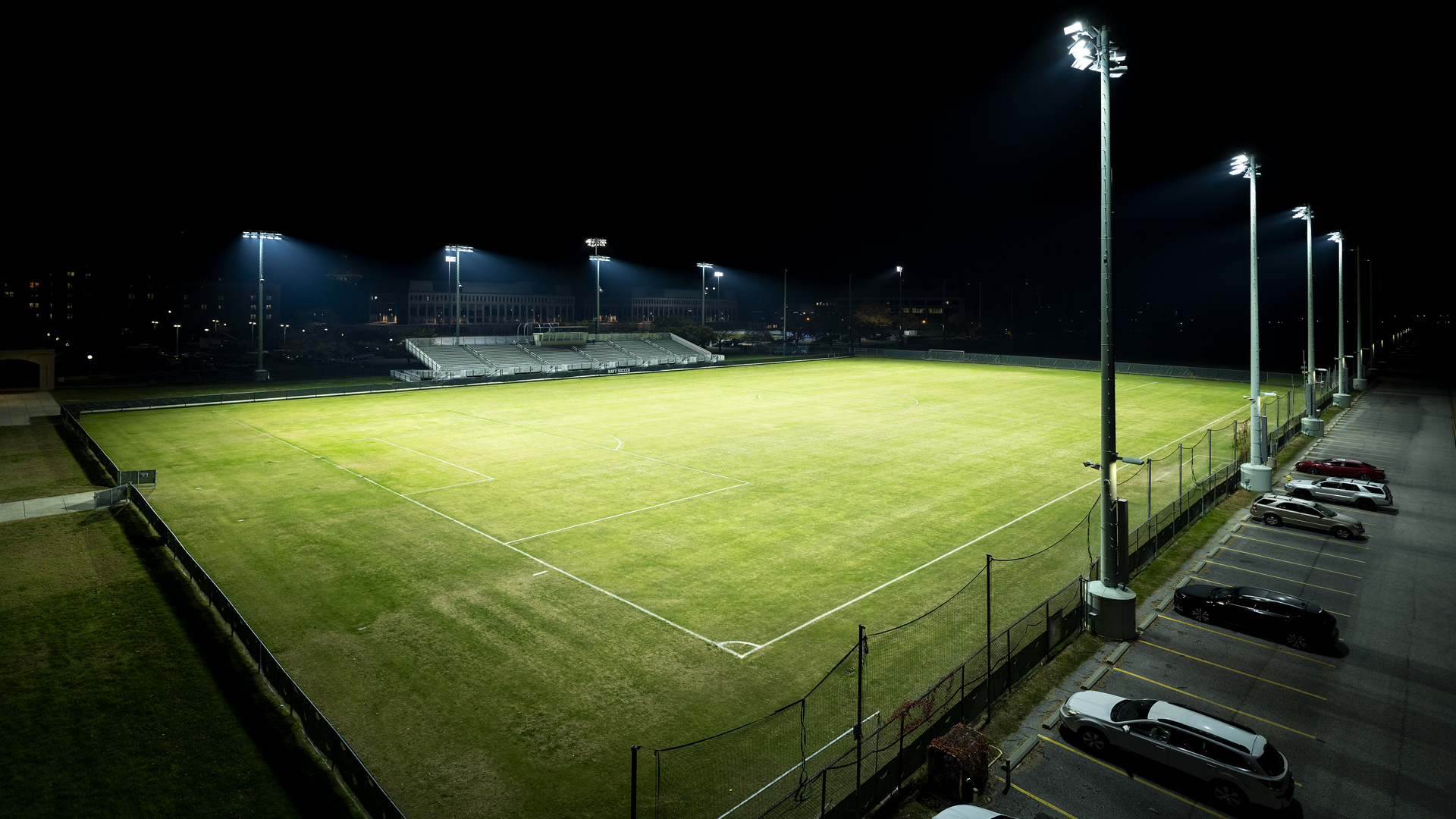 Soccer field at US Naval Academy uniformly lit to appropriate light levels after retrofitting sports lighting to Musco's TLC for LED system.