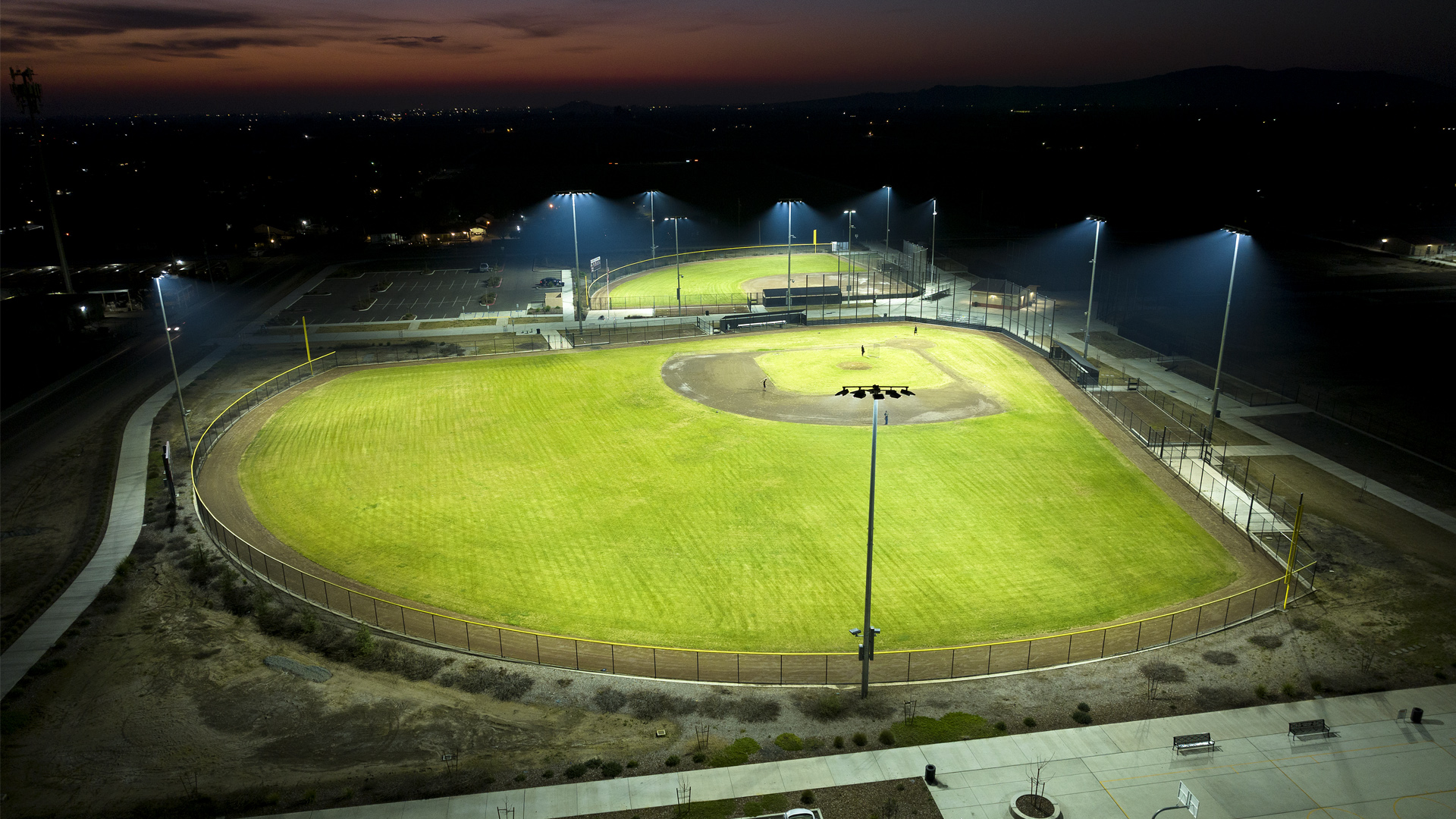 Baseball and softball fields at Cutler-Orosi Sports Complex lit with new LED field lighting while eliminating spill and glare to surrounding areas.