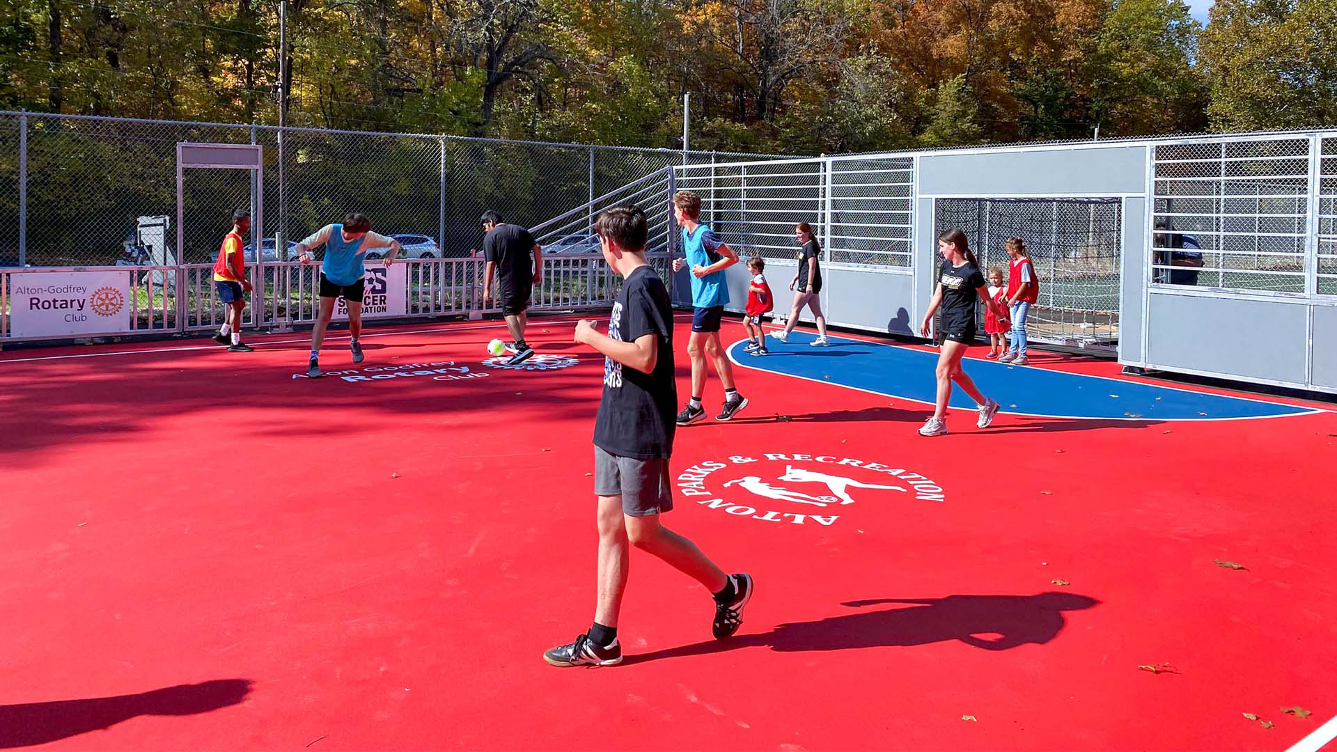 Kids play soccer on new Mini-Pitch System®