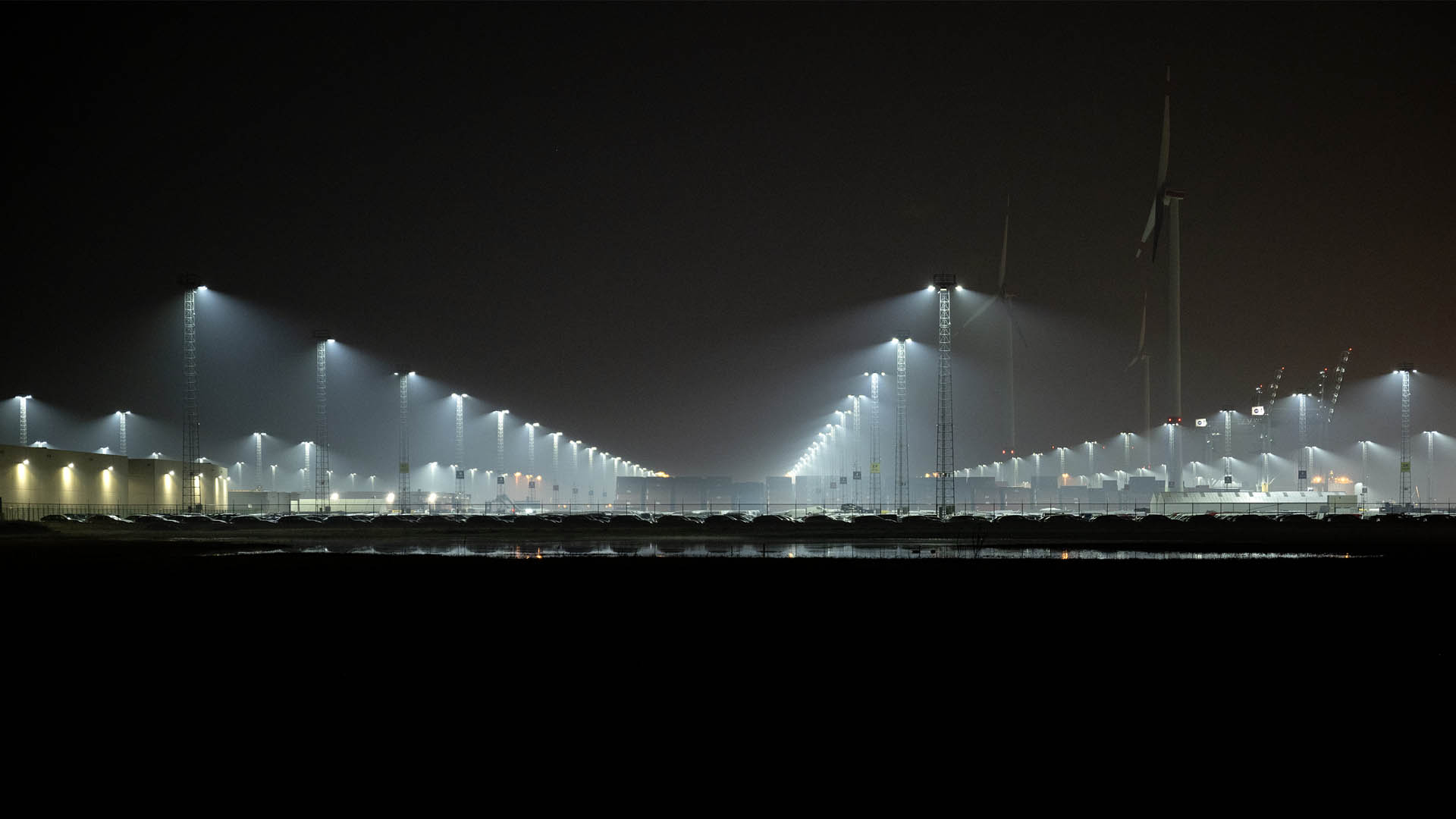 Musco's patented fixture visoring directs light where it's needed on the port, increases worker safety while eliminating spill and glare to the neighboring nature preserve at Antwerp Terminals.