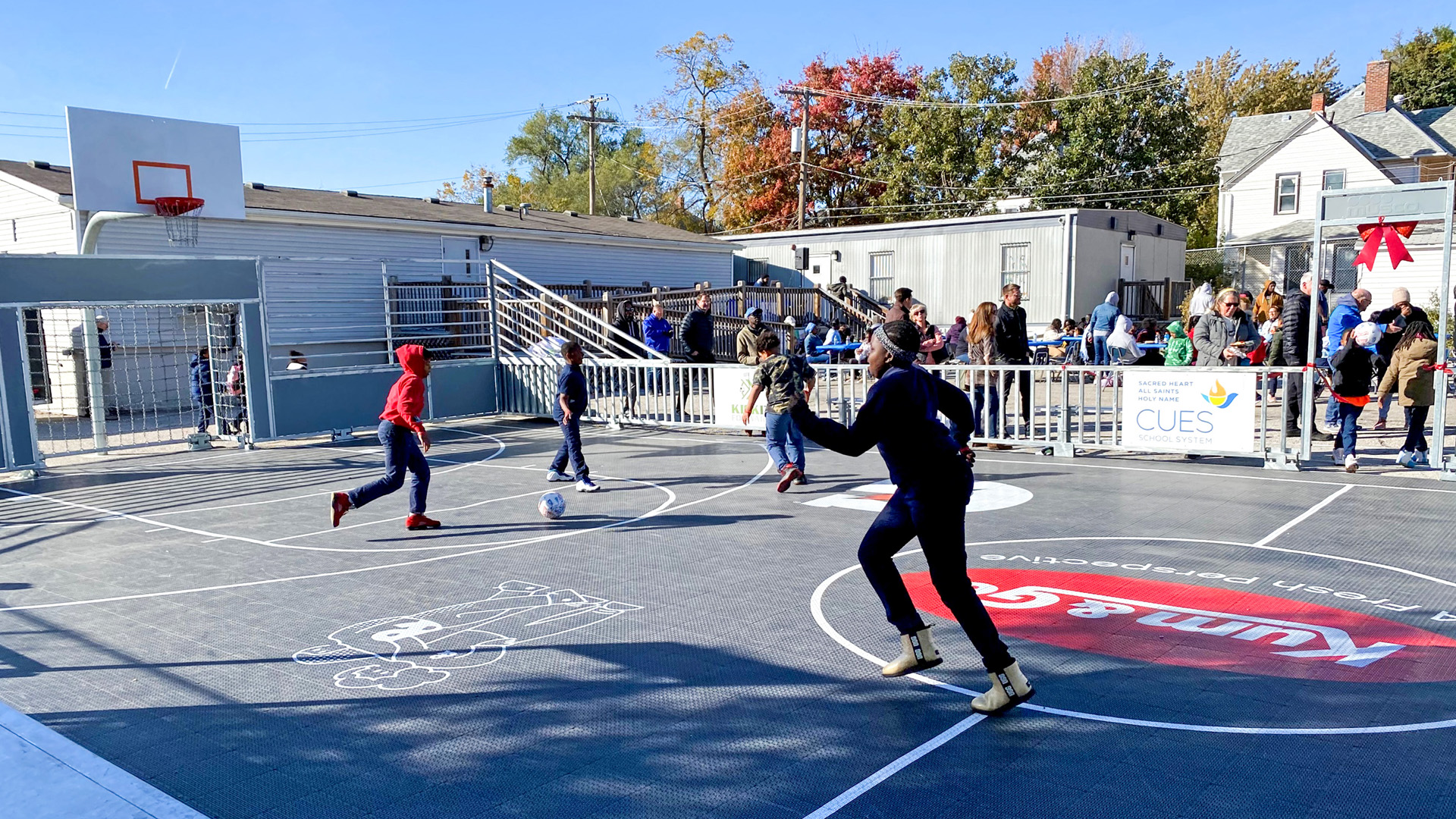Kids play soccer on new Mini-Pitch at Sacred Heart School