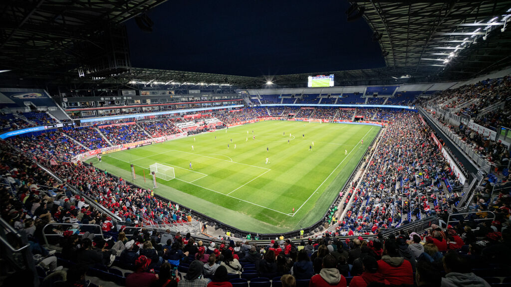 Soccer game at Red Bull Arena being played at night under new LED stadium lights.