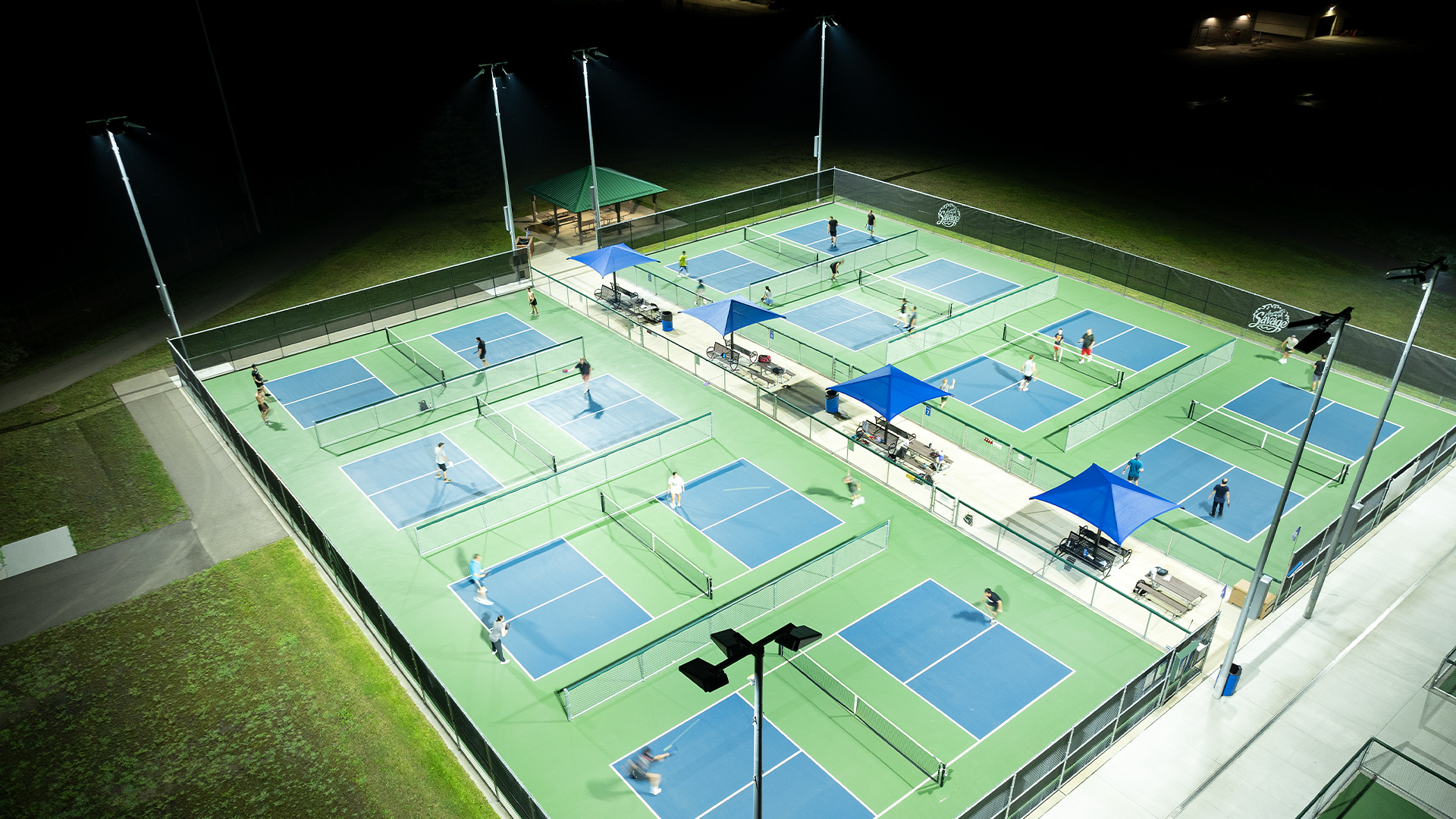 Savage, Minnesota residents play under new LED pickleball lights at Community Park.