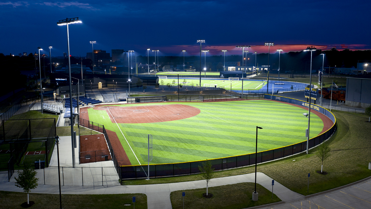 Baseball field park with overhead lighting