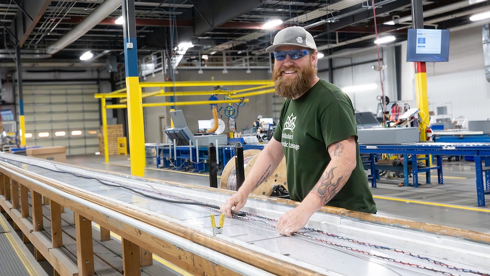 lighting specialist working in warehouse