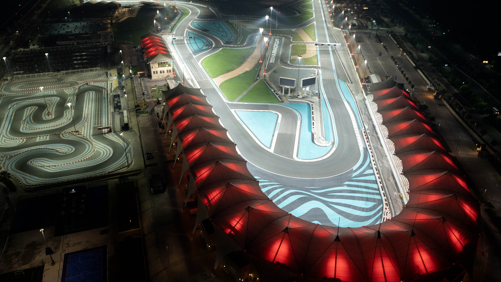 racetrack lights illuminated at night