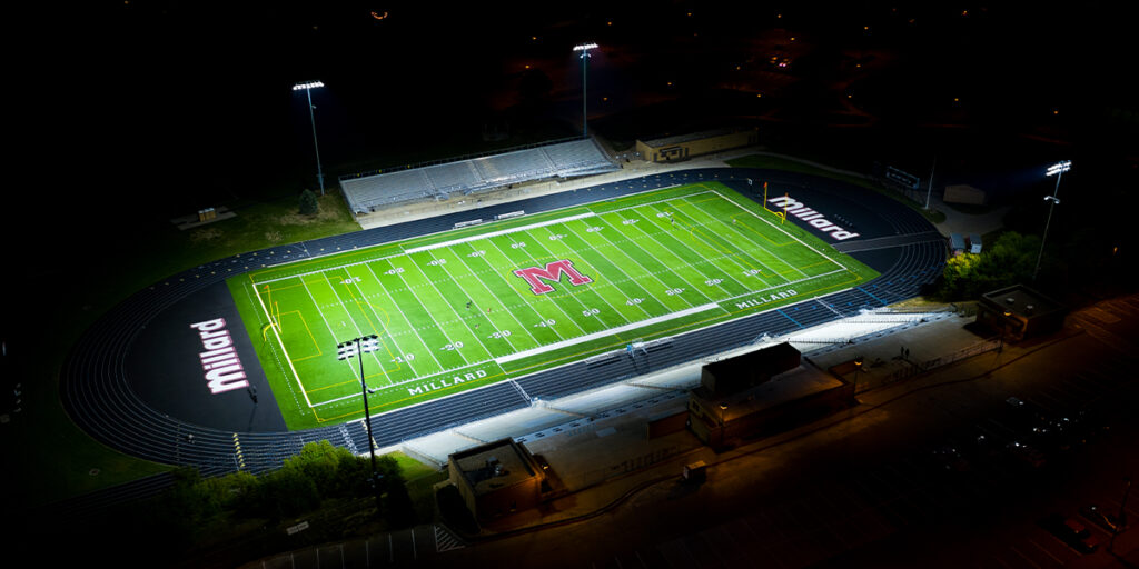 Buell Stadium football field lit at night with Musco TLC for LED system