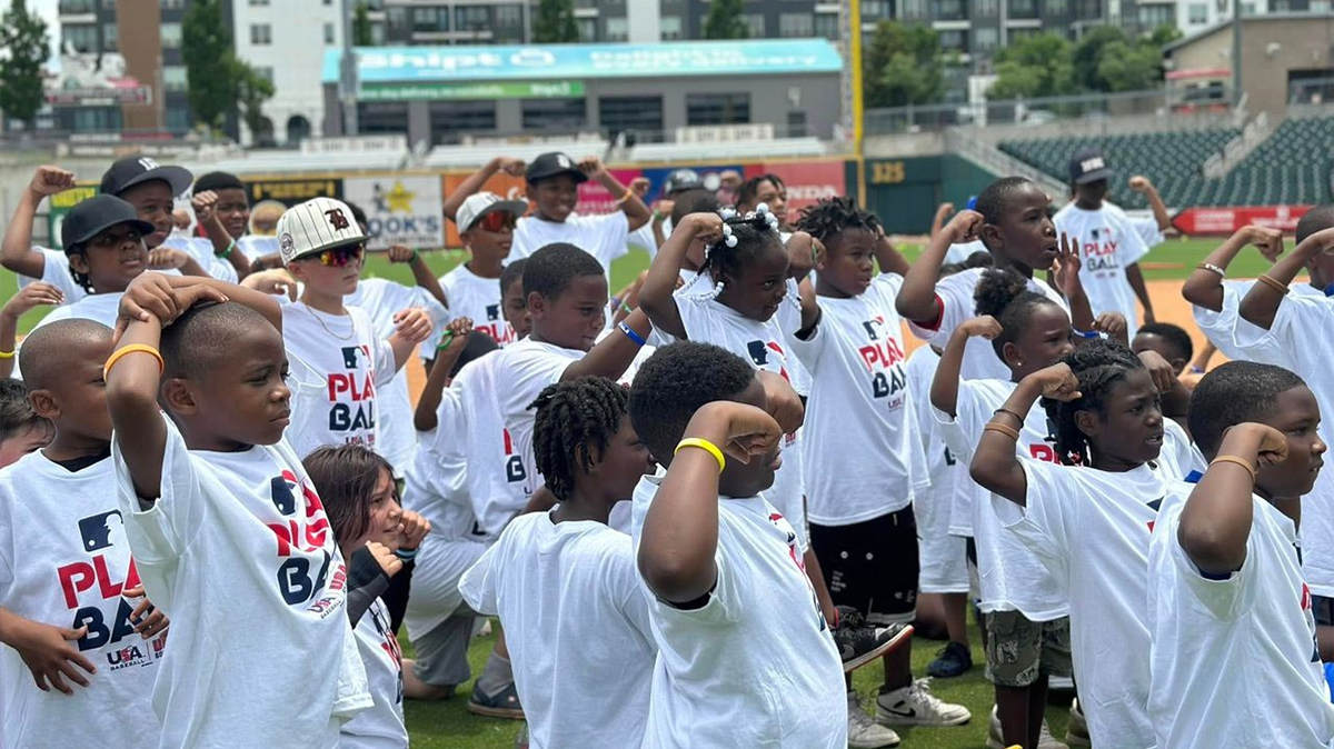 Kids flexing over their heads