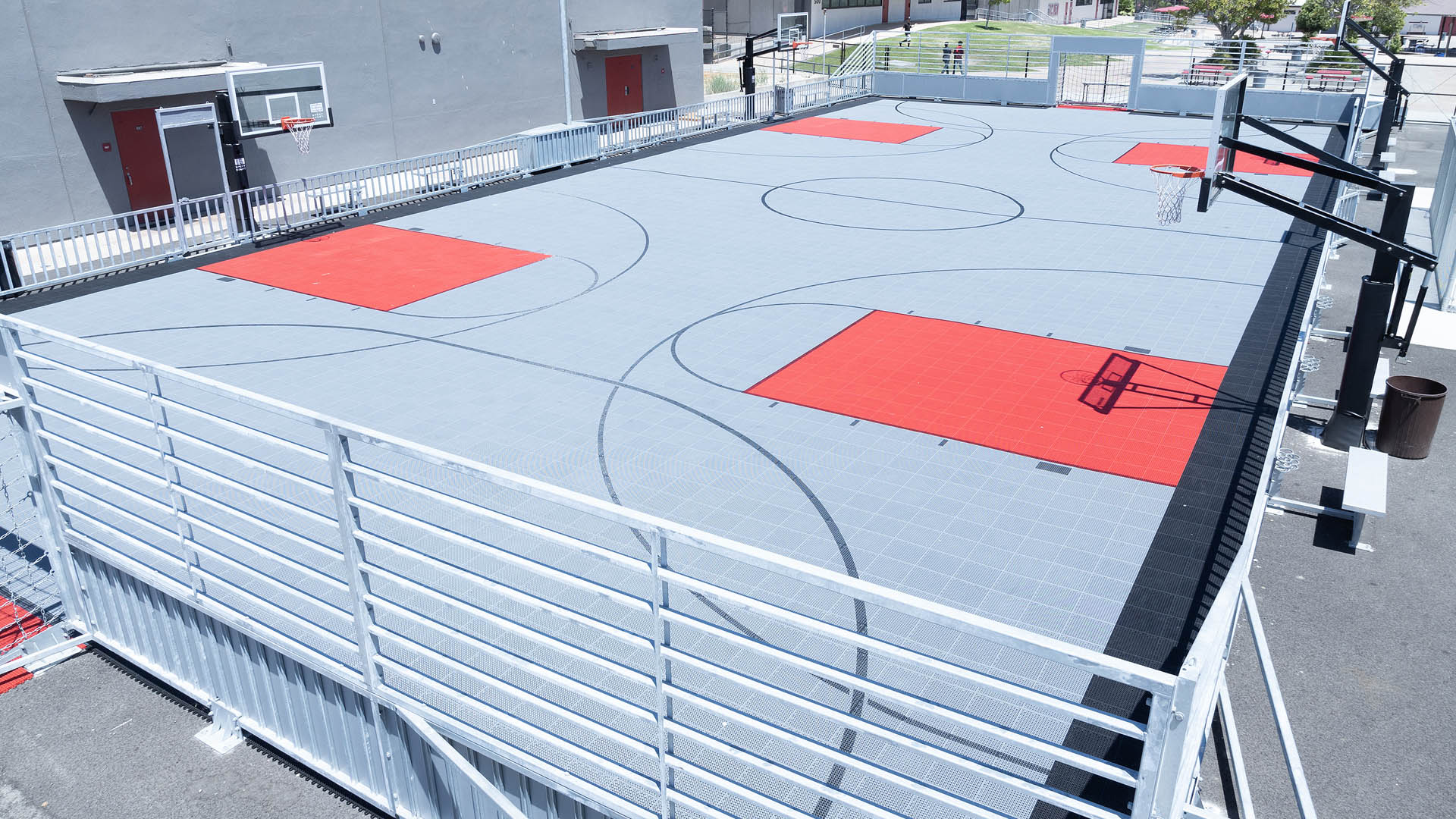 Gray and red basketball mini pitch