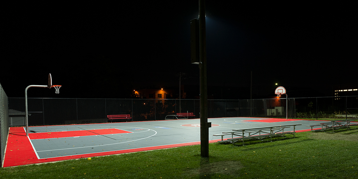 outdoor basketball court at night time
