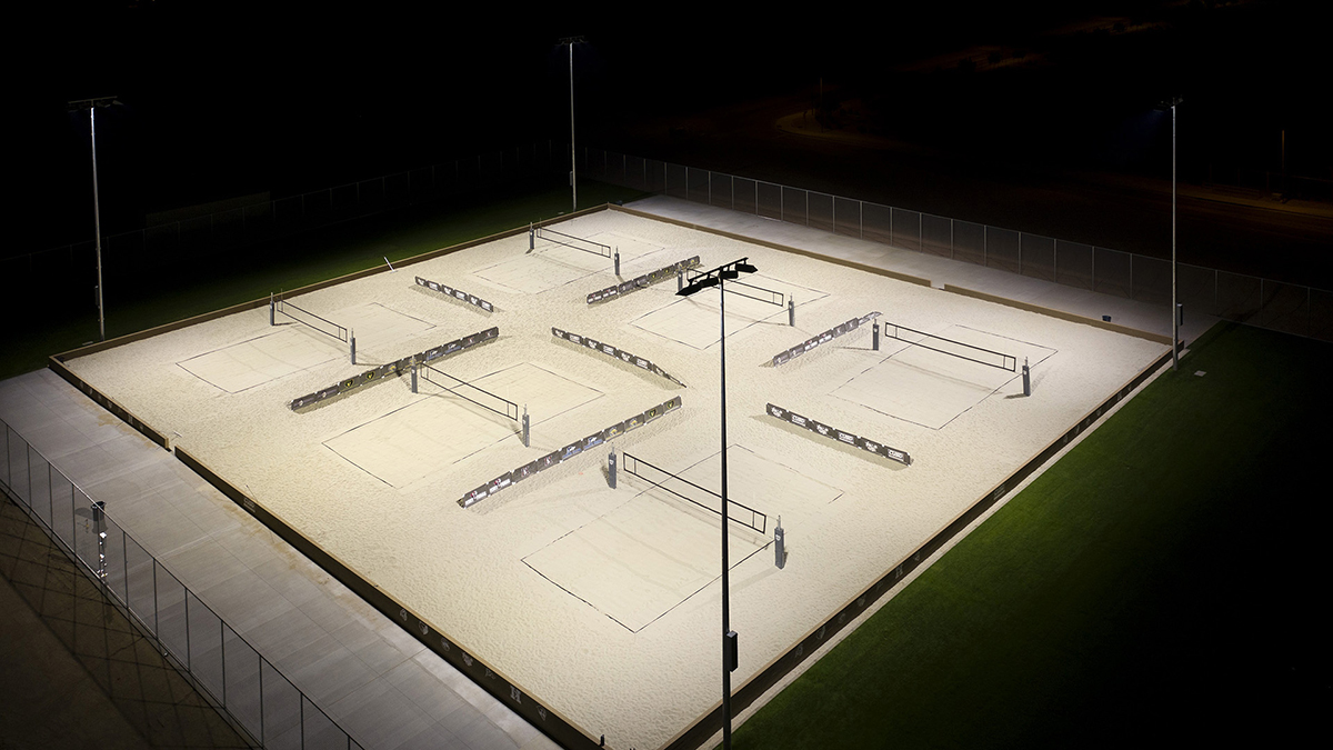 6 beach volleyball courts at night